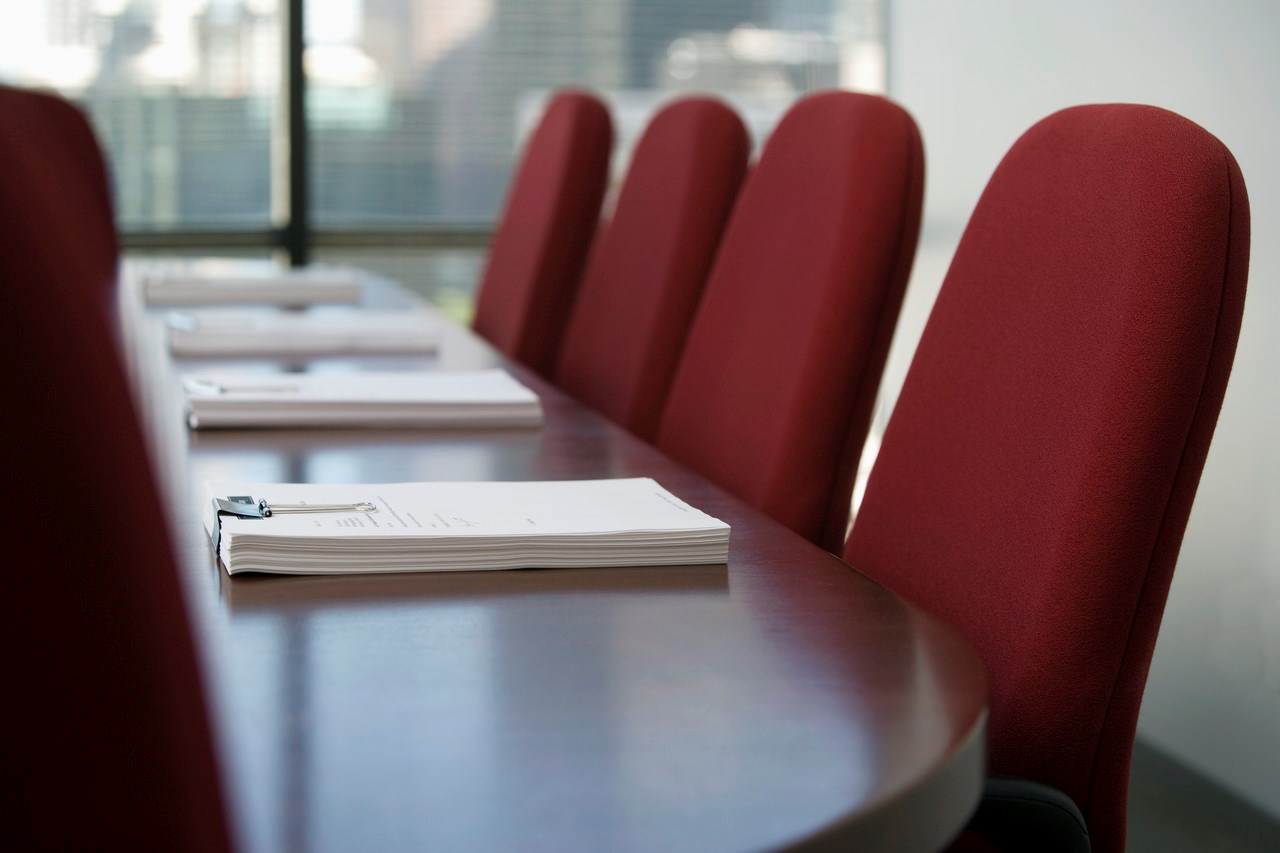 Picture of meeting room with chairs and table