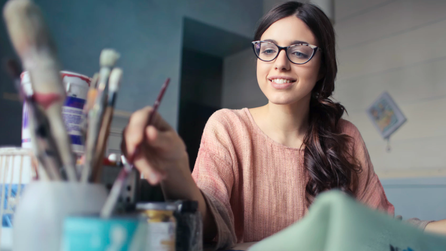 Picture of student working in art class