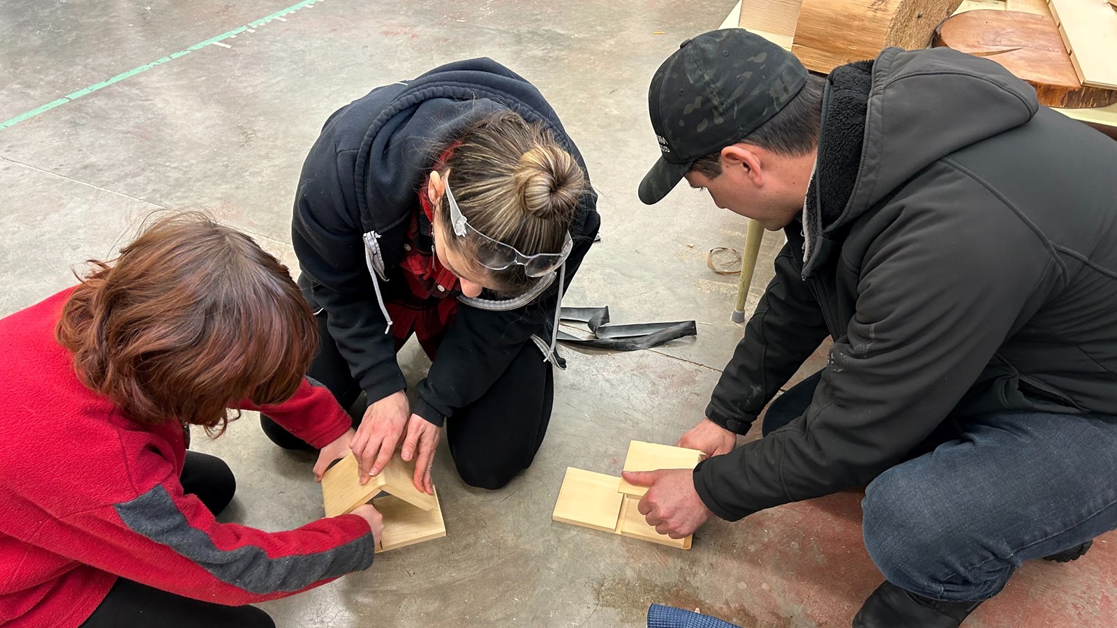 Assembling the sides of the boxes.