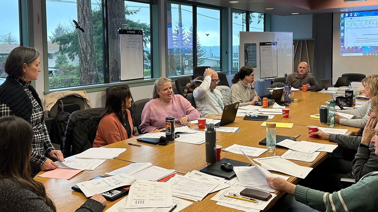 Members of the district's numeracy committee reviewed several math assessment and screener tools on January 8.