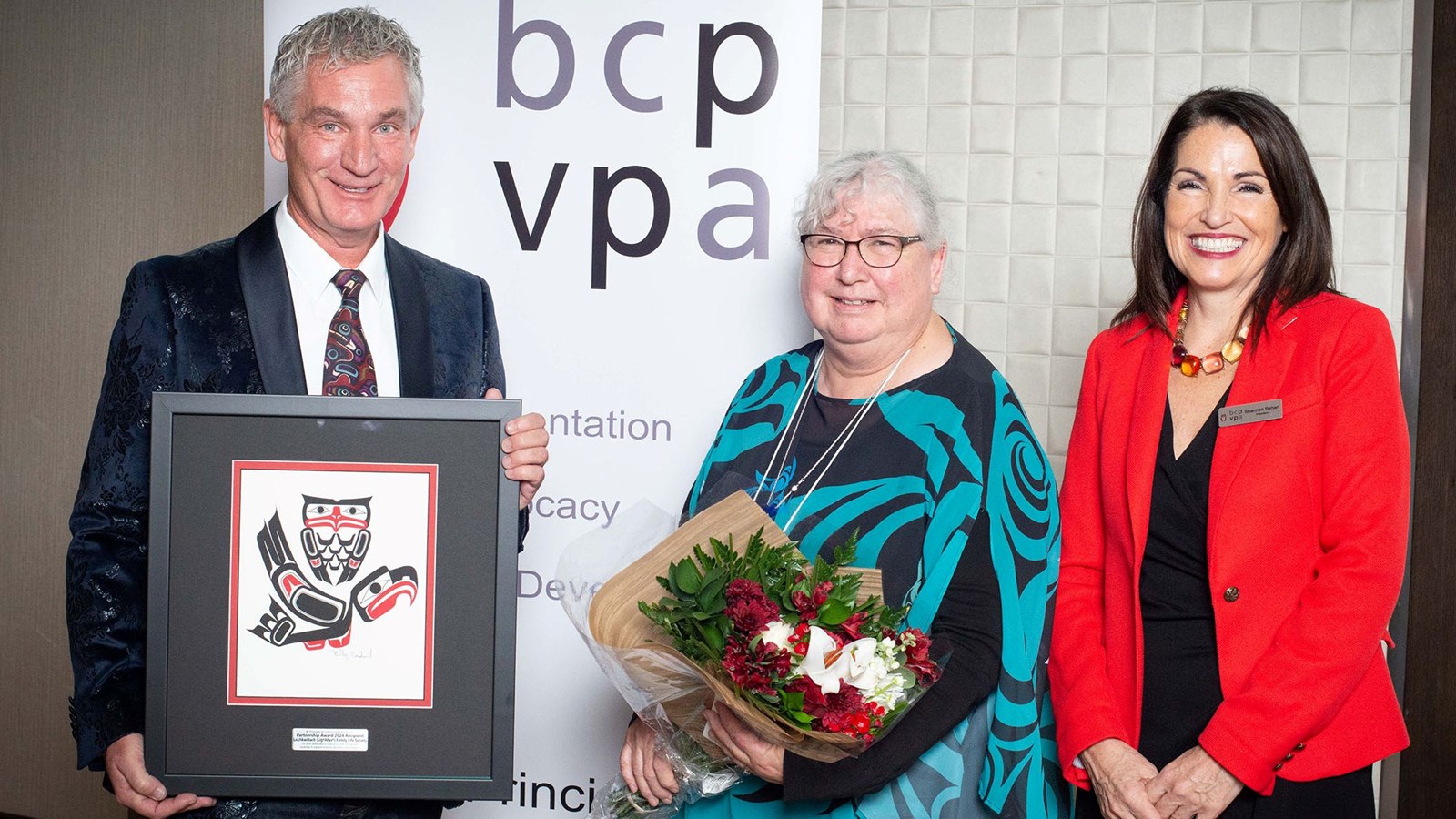BCPVPA Board Director Bry Williams and President Dr. Shannon Behan with Laichwiltach Family Life Society Director Audrey Wilson.
