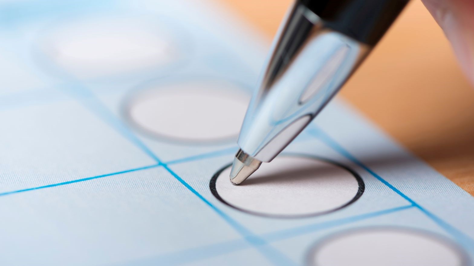 Pen marking a voting ballot.
